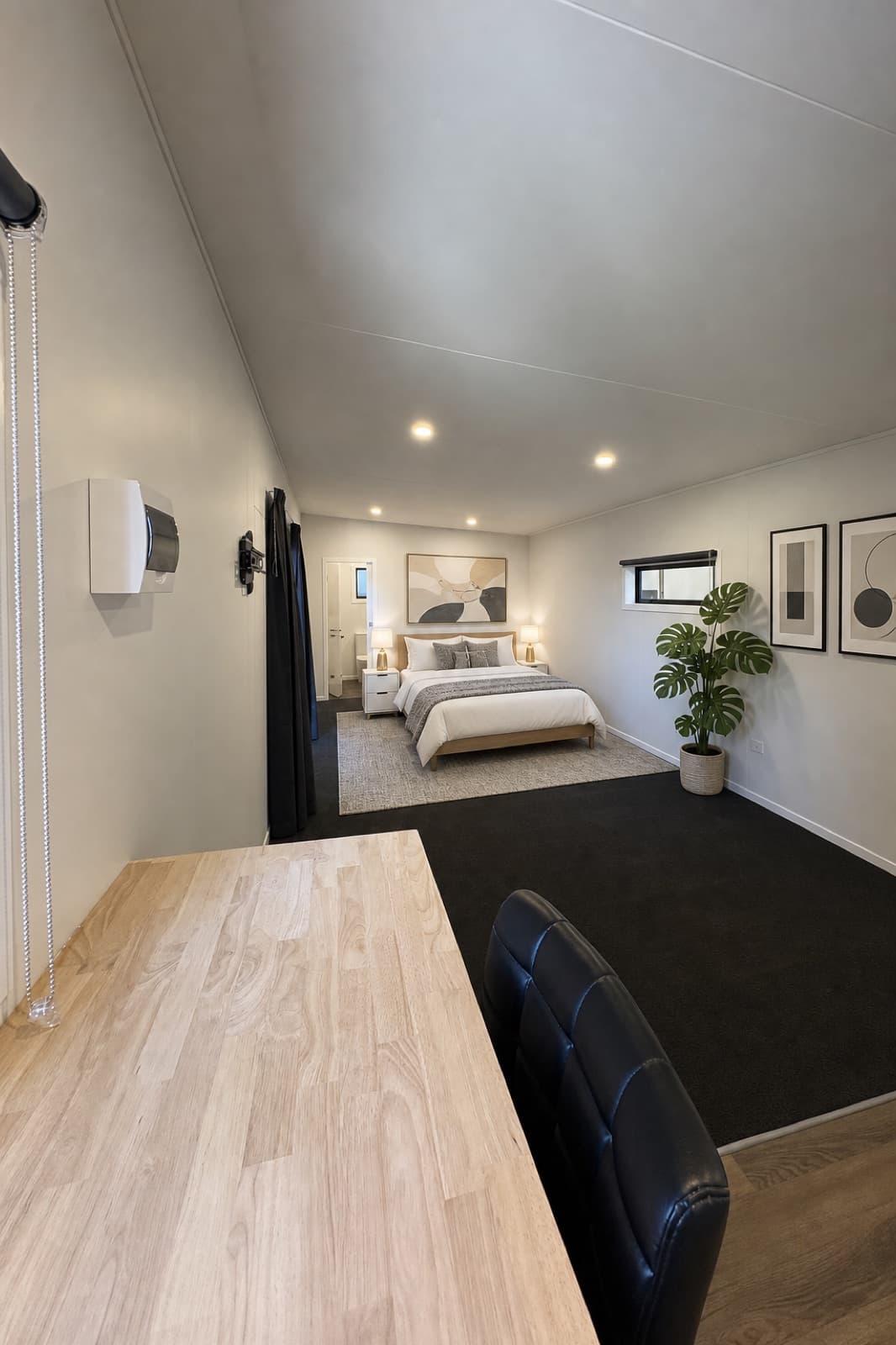Warm modern tiny home bedroom interior