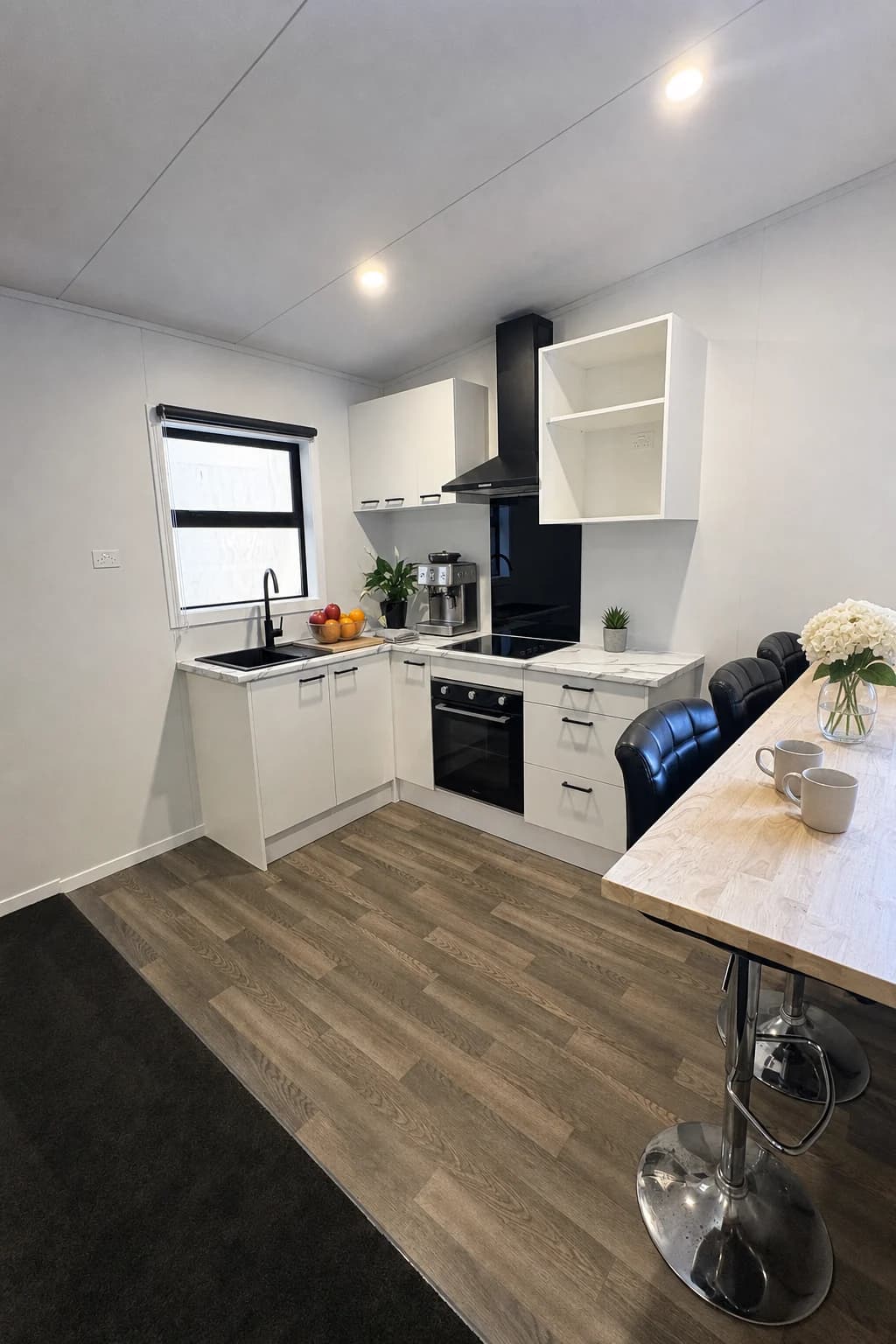 Eve 10×3.5 tiny home interior render - kitchen and breakfast bar
