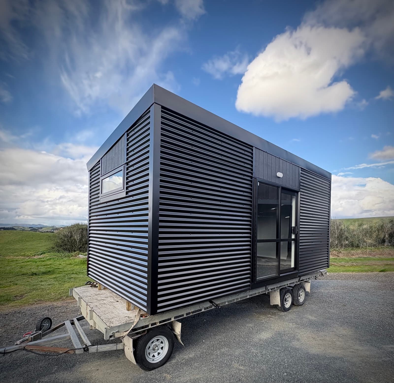 Compact NZ-made cabin on a residential section